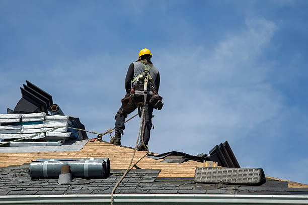 Professional Gutter Installation technician working in Lind, WA